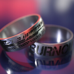 Кільце з титану зі словом Burnout і слідом від протектора
